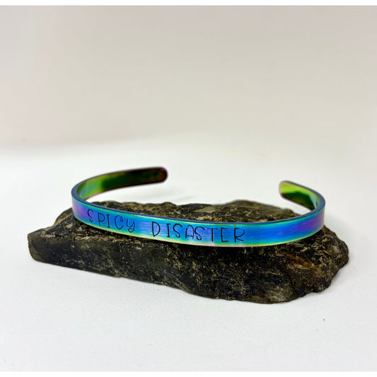 Spicy Disaster Iridescent Cuff Bracelet – Hand-Stamped Rainbow Stainless Steel Jewelry