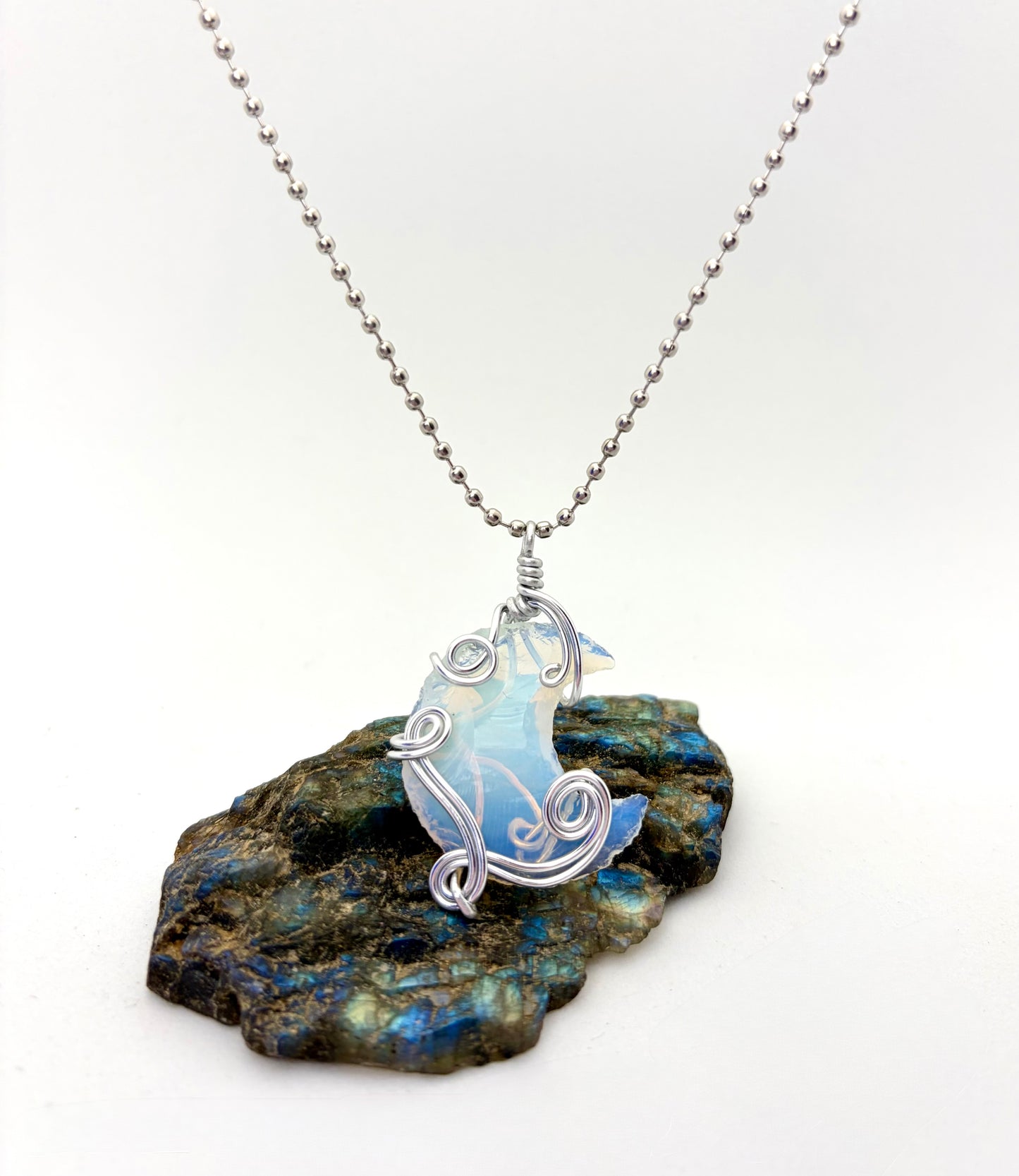 Lunar Glow” – Silver Aluminum Wire Wrapped Opalite Crescent Necklace