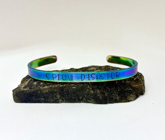 Spicy Disaster Iridescent Cuff Bracelet – Hand-Stamped Rainbow Stainless Steel Jewelry