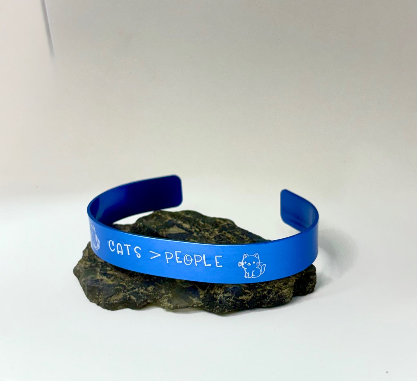 Cats > People Blue Aluminum Cuff Bracelet — Hand Stamped Cat Lover Jewelry
