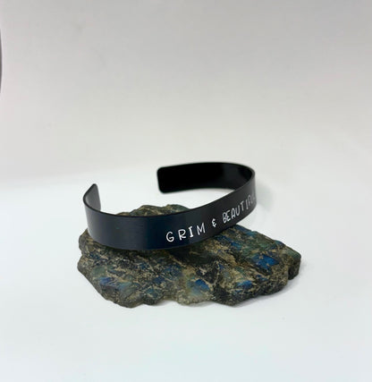 Grim & Beautiful Black Cuff Bracelet – Hand Stamped Gothic Bracelet for Alternative Style