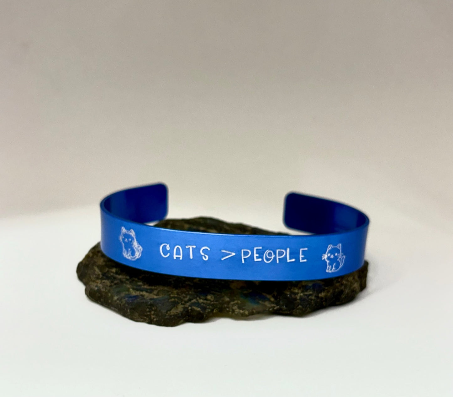 Cats > People Blue Aluminum Cuff Bracelet — Hand Stamped Cat Lover Jewelry