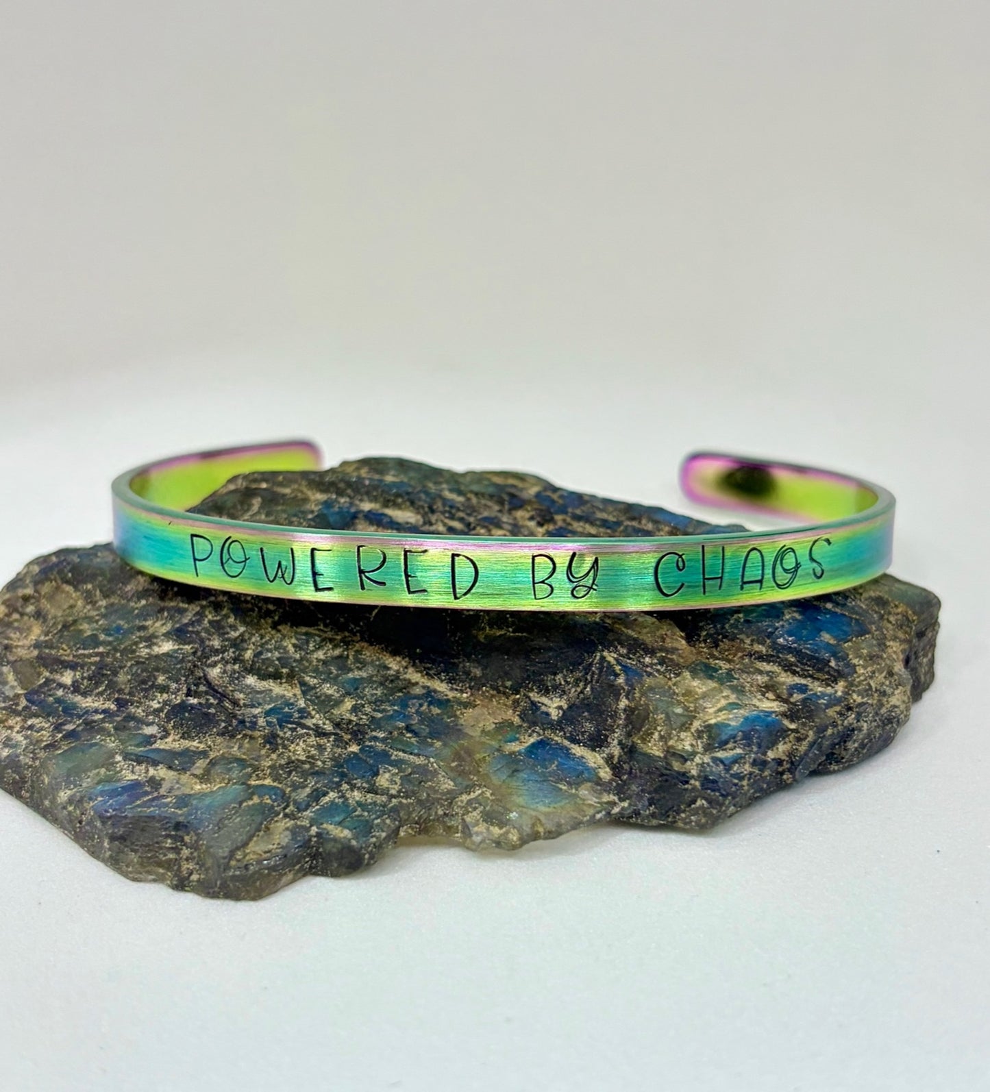 Powered By Chaos Bracelet – Iridescent Rainbow Hand-Stamped Cuff Stainless Steel