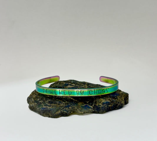 Powered By Chaos Bracelet – Iridescent Rainbow Hand-Stamped Cuff Stainless Steel