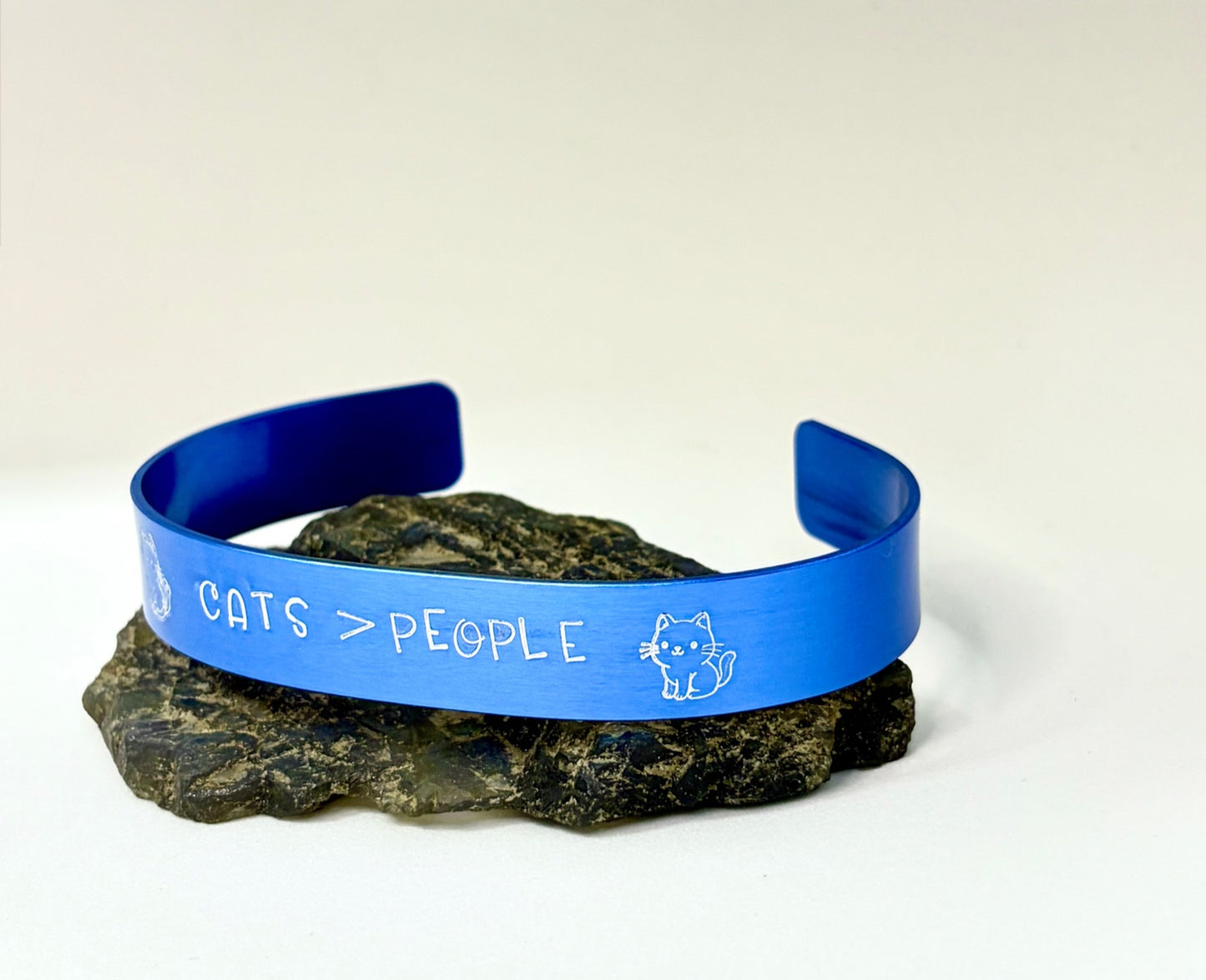 Cats > People Blue Aluminum Cuff Bracelet — Hand Stamped Cat Lover Jewelry