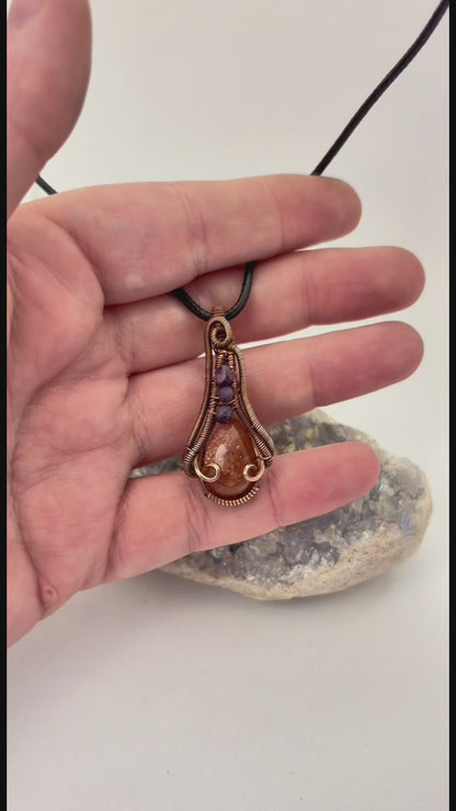 Sunbeam & Starlight – Copper Wire Wrapped Goldstone + Amethyst Pendant