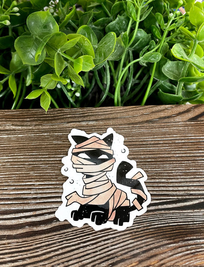 Black Cat in Mummy Costume, Die Cut Vinyl Sticker, Boho Fun, Water Resistant, Halloween Spooky Party Character |Sticker or Magnet